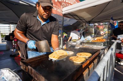 Mississauga, On - July 29: The incredible production, loving communities, delicious gastronomy, different musical and artistic genres - along with the spectacular parade with beautiful costumes - makes the Mississauga Latin Festival unmissable. The festival features a large children's area with free activities for children, and more than 90 vendors of crafts, products and services live on July 29th, 2023 at Celebration Square in Mississauga, Ontario, Canada (Photo by Adam Pulicicchio Photography)